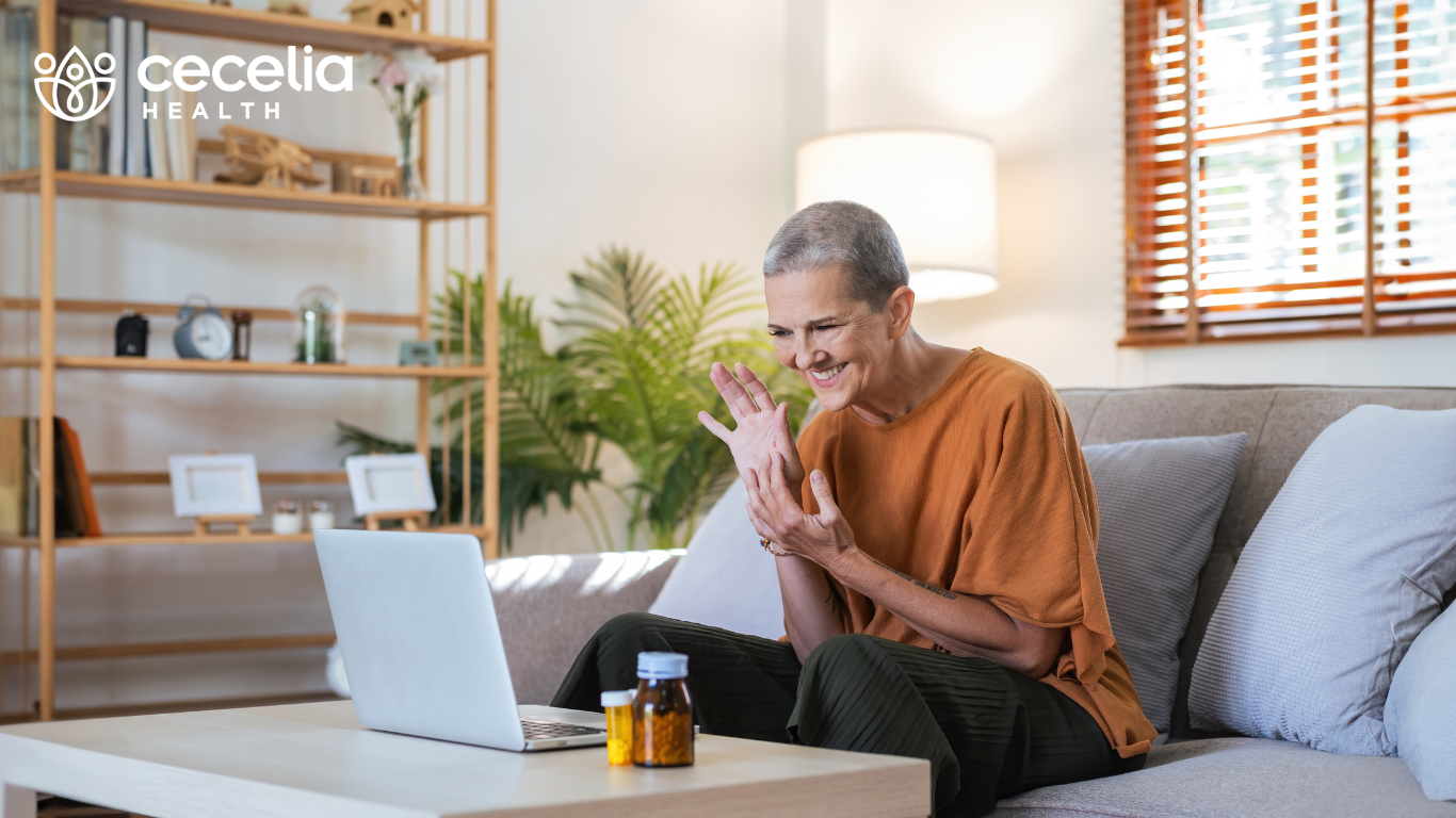 a person sitting at a computer in living room