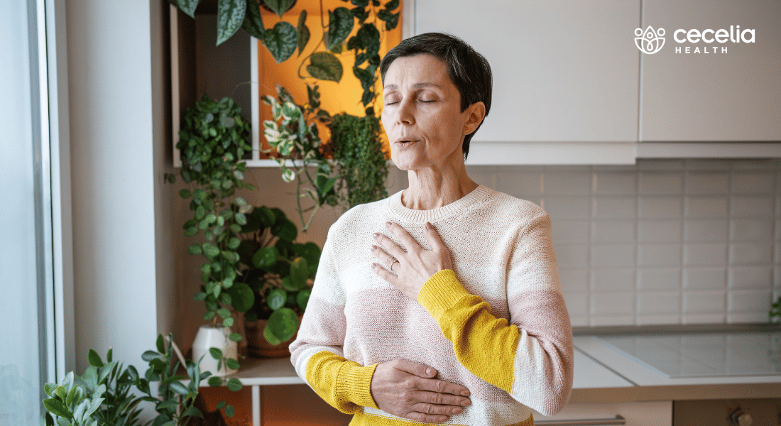 woman taking deep breaths