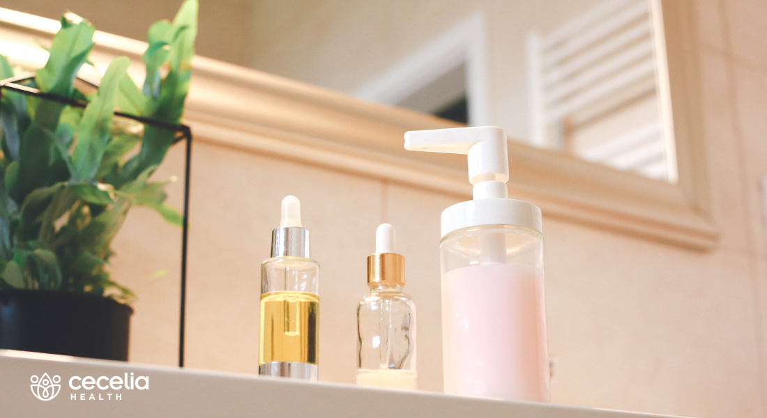 skin care products lined up on a bathroom counter