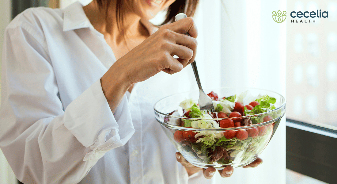 woman eating healthy salad