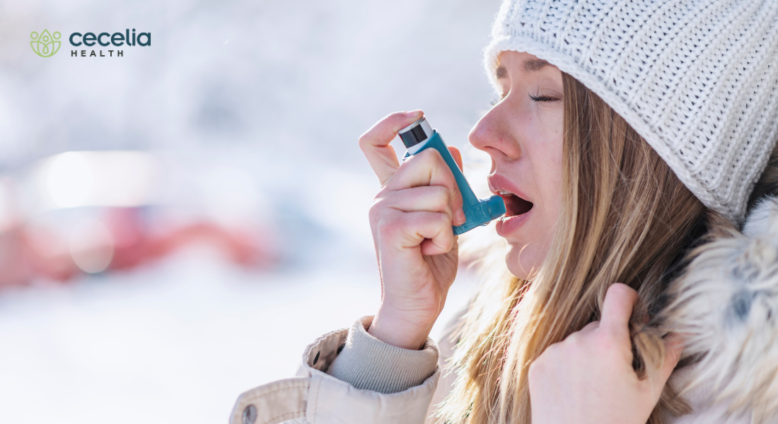 woman with inhaler in winter