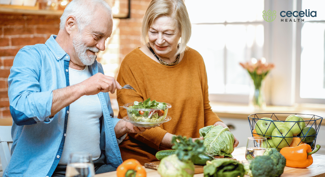 senior adults cooking together in the kitchen