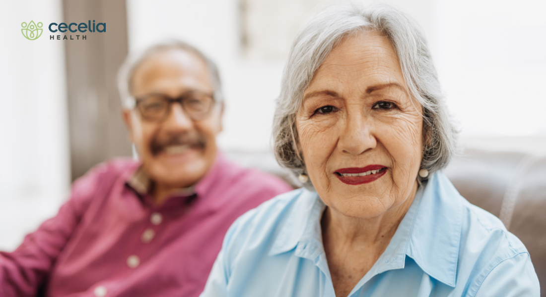 mature couple sitting on couch